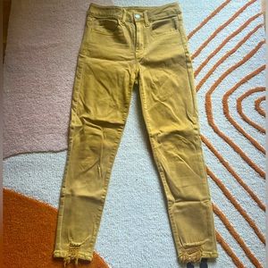 Ripped yellow American eagle jeans